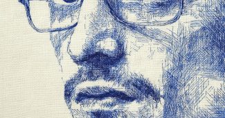 AI提示词_简单的十字绣头像图案，蓝墨水印在白色面料上，年轻男士，戴眼镜，短发和小胡子_chatgpt在线网页使用缩略图