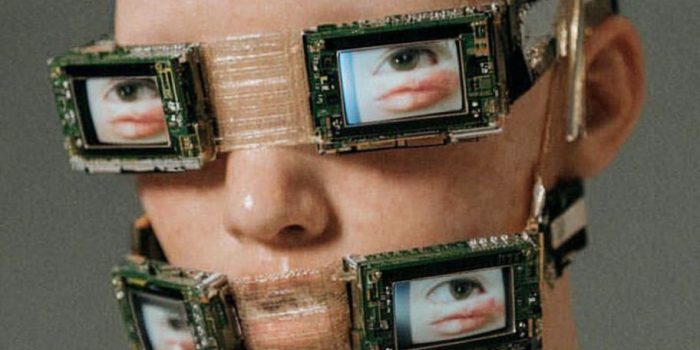 ChatGPT_AI提示词_人形头部覆盖小型LCD屏幕，展示眼睛、嘴唇和皮肤的特写片段_chatgpt会员多少钱一次缩略图