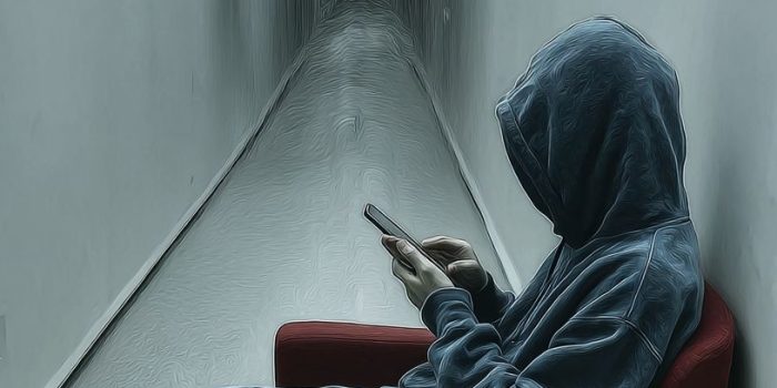 Ai提示词_一个穿着蓝色卫衣的男人坐在现代红色椅子上，侧身使用手机缩略图